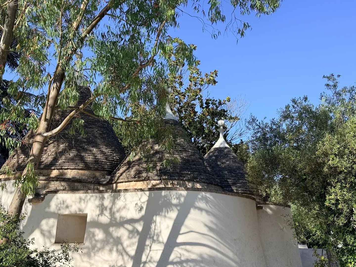 Trulli cone of Trulli Musorosso against the sky